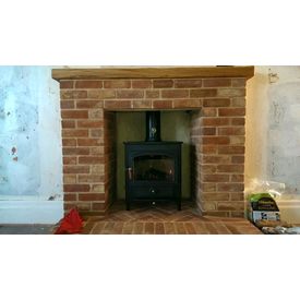 Clearview Vision 500 8kw stove in a brick fireplace built by Kevin Block 