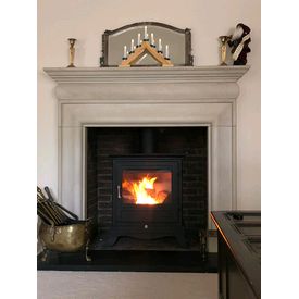 Chesneys Beaumont 8 woodburner and a umbrian stone capital Fireplaces mantel