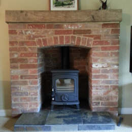 Brick Fireplace and Oak Beam
